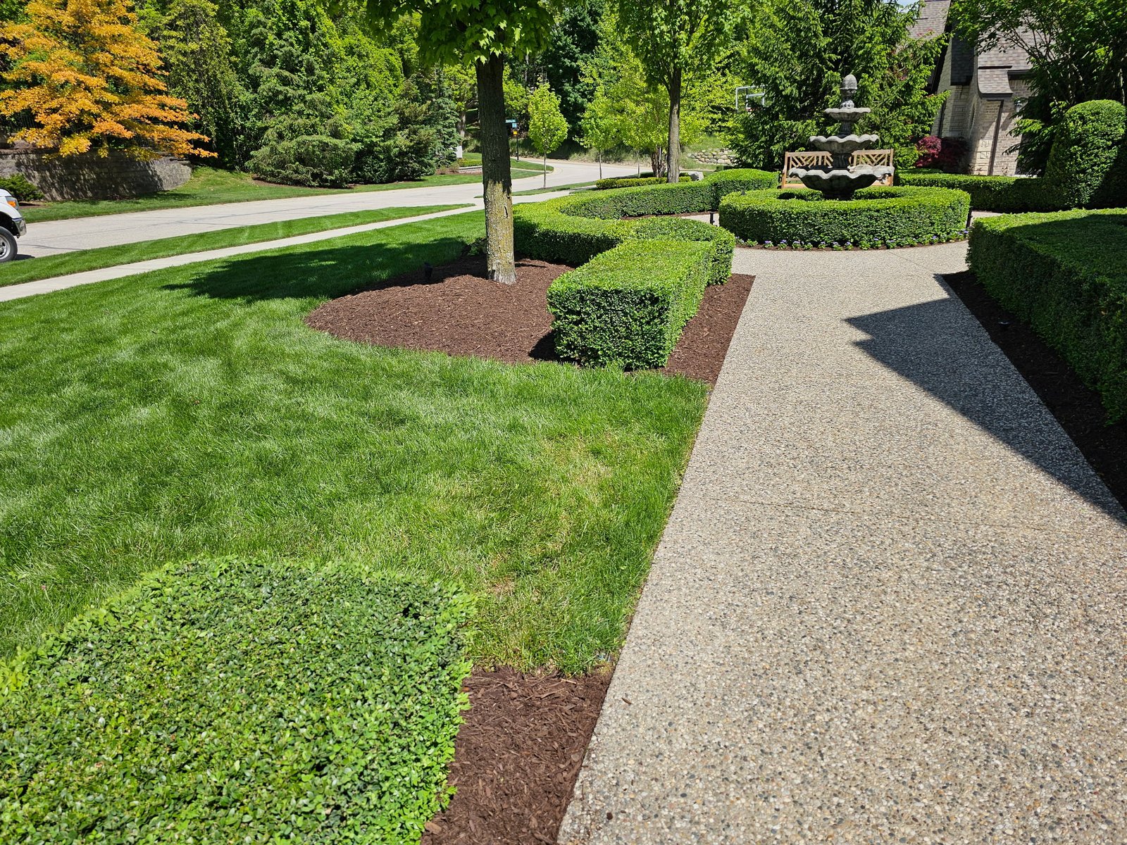 New lawn with freshly laid sod in front yard – Washington, MI